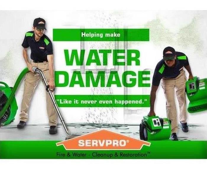 SERVPRO of La Jolla can help your water damage. - Image of technicians cleaning water damage.