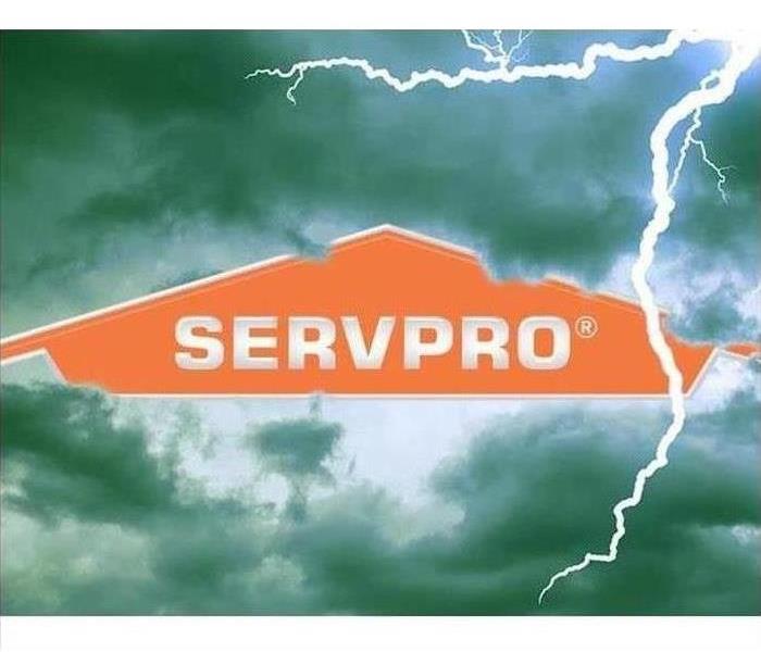 SERVPRO logo with a storm in the background 